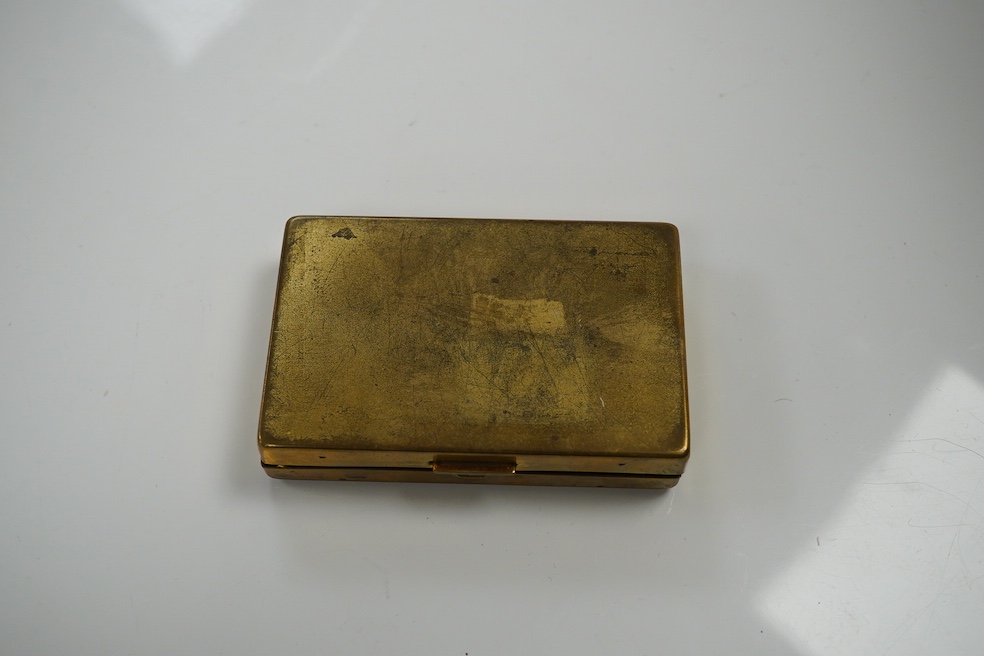 A Japanese damascened iron and gilt metal musical compact, 9cm wide. Condition - poor